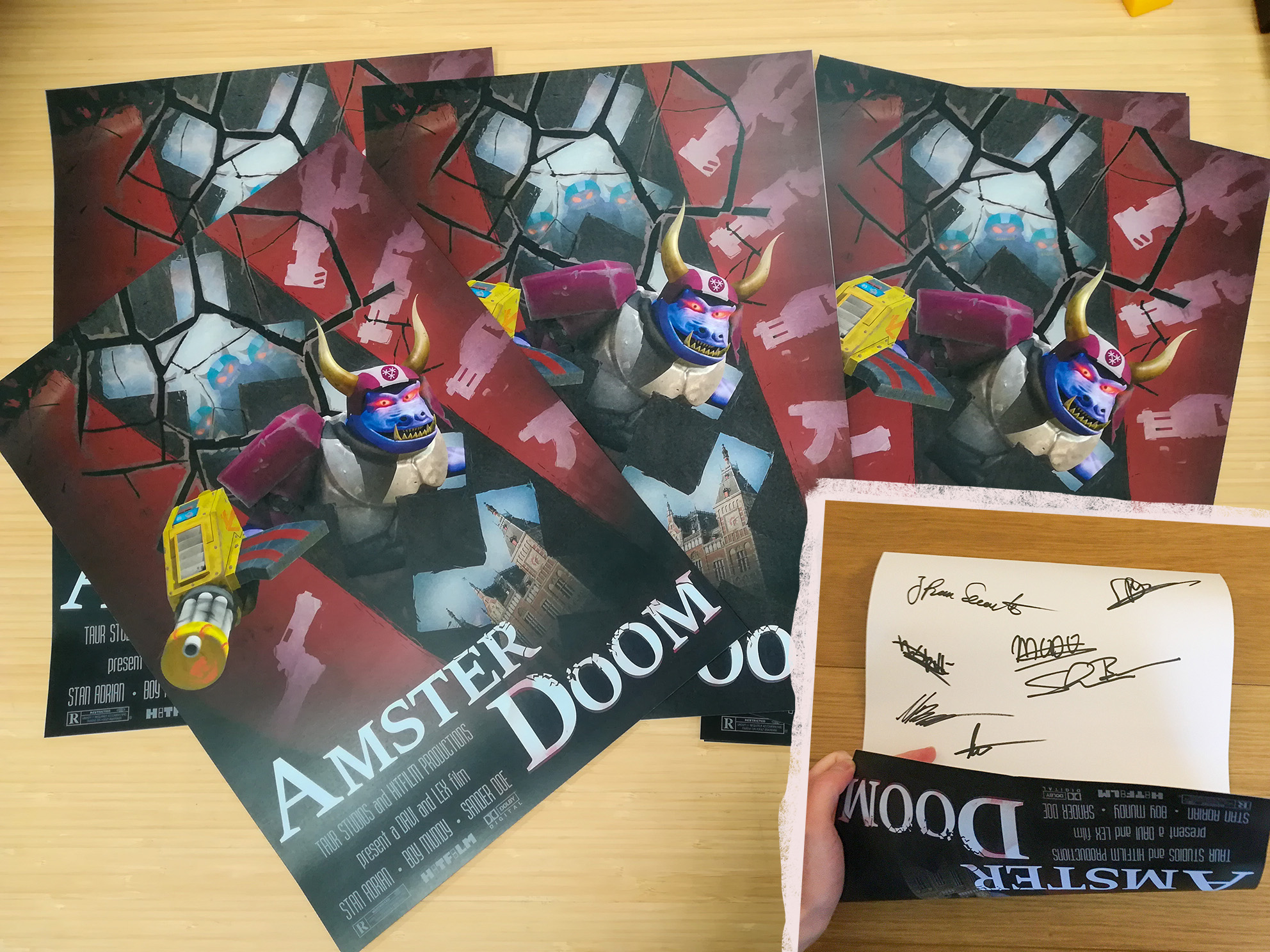 Physical posters including autographs of the developers